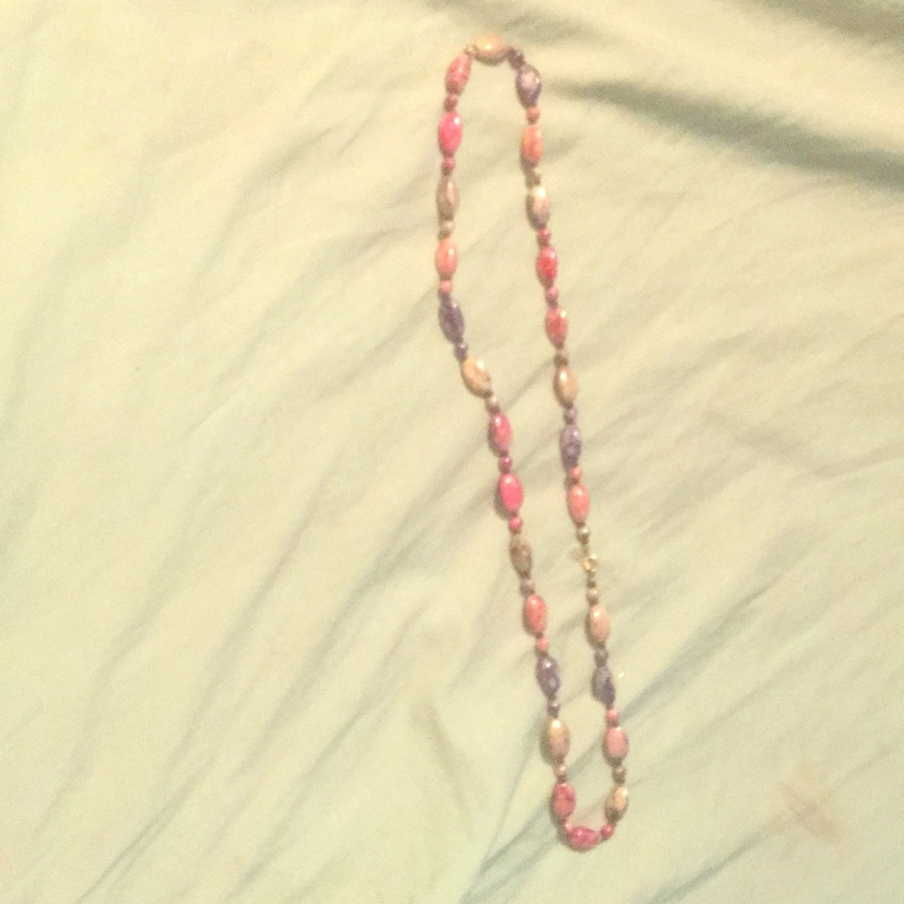 A pastel colored the beaded necklace